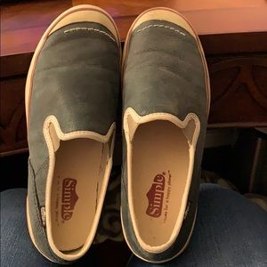 Simple Shoes slip on black leather sneakers.